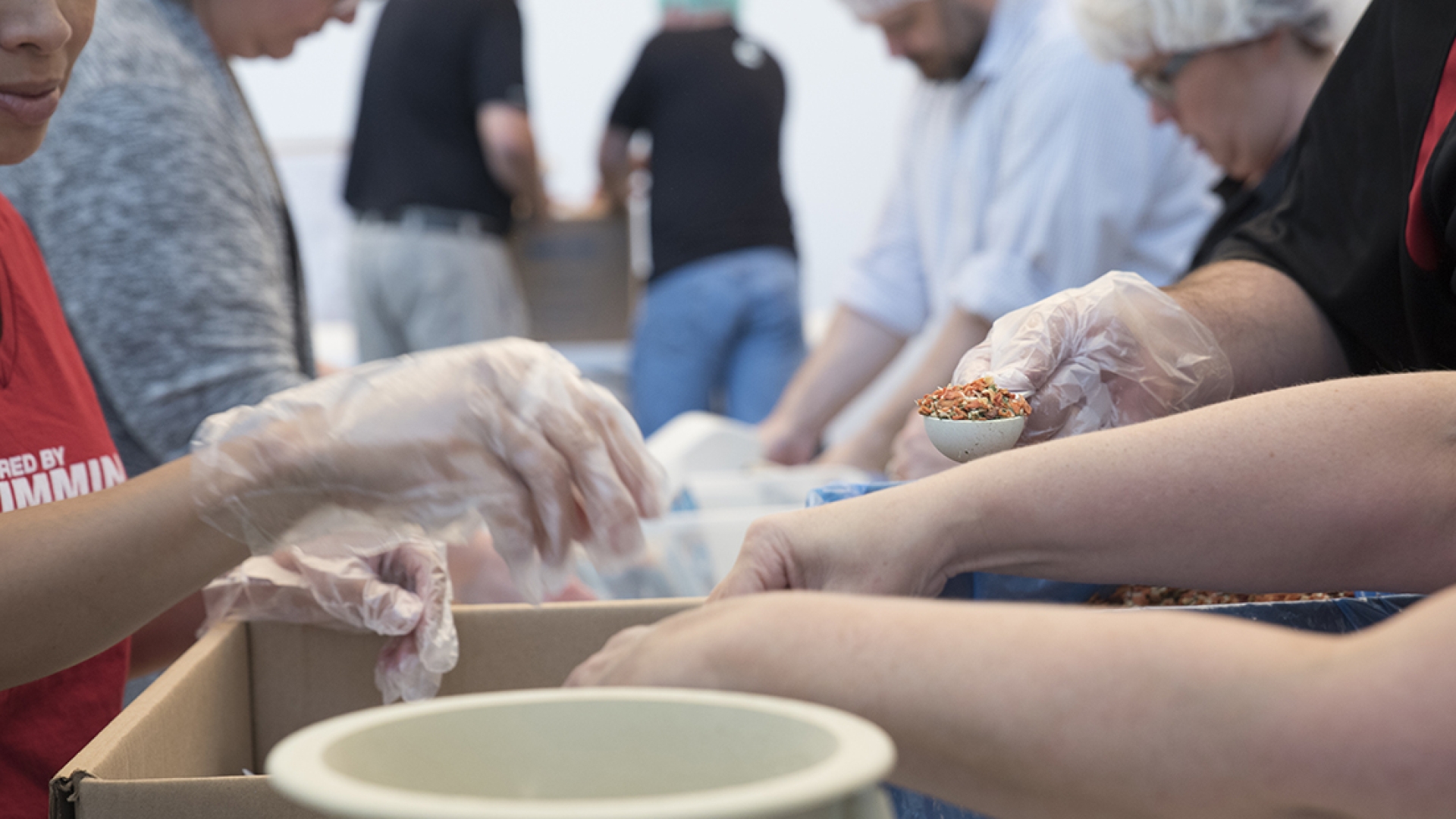 People making clay bowls