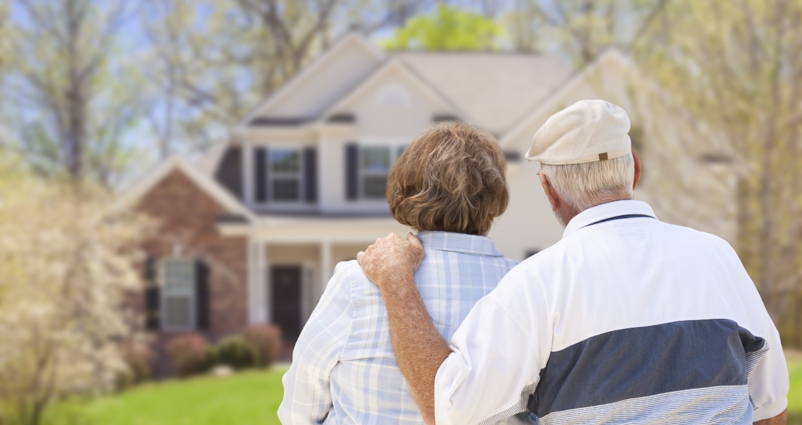 couple looking at their home