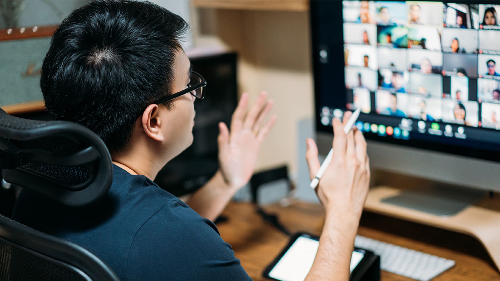 Employee speaking virtually on a Zoom conference call
