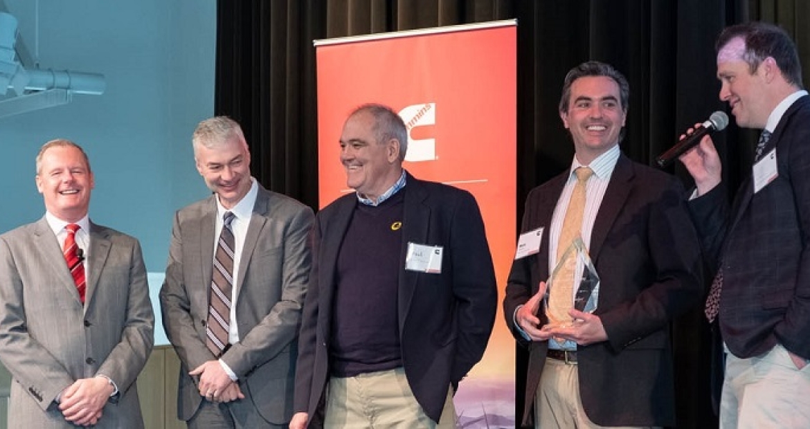 The winning team from BBC Pump and Equipment Co. Inc. is joined on stage by Cummins' Denis Ford (far left) and Jim Gruwell (second from left) at the first Cummins U.S. Innovation Gateway. The winning team from BBC Pump and Equipment Co. Inc. is joined on stage by Cummins' Denis Ford (far left) and Jim Gruwell (second from left) at the first Cummins U.S. Innovation Gateway.