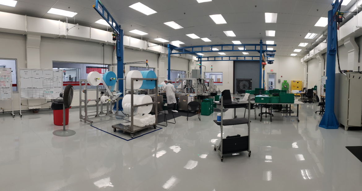 Employees make masks at the Columbus Engine Plant in Indiana. It is one of three locations making masks for essential Cummins employees around the world.