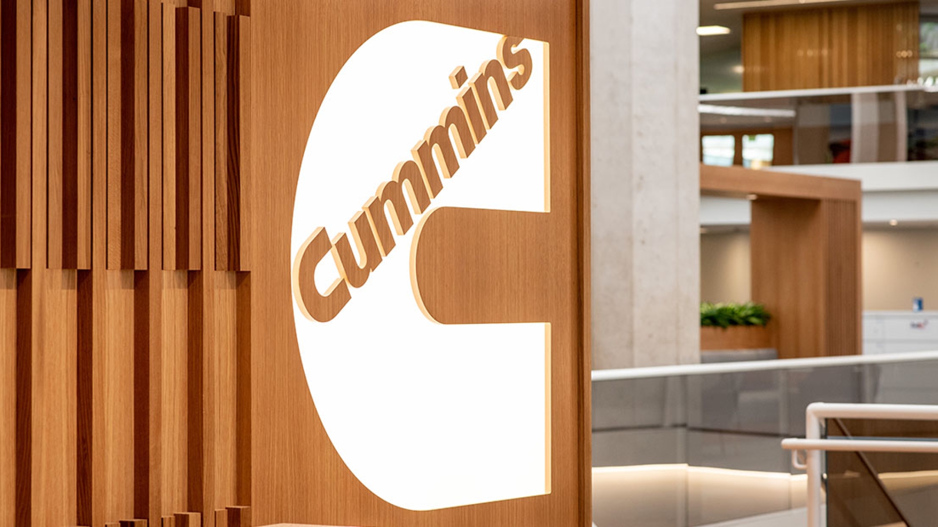 white Cummins logo at entrance of corporate office