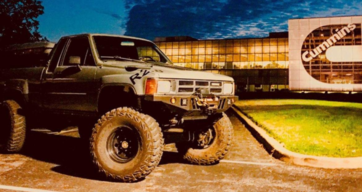 Repowered TAV Toyota Xtra Cab in front of Cummins building