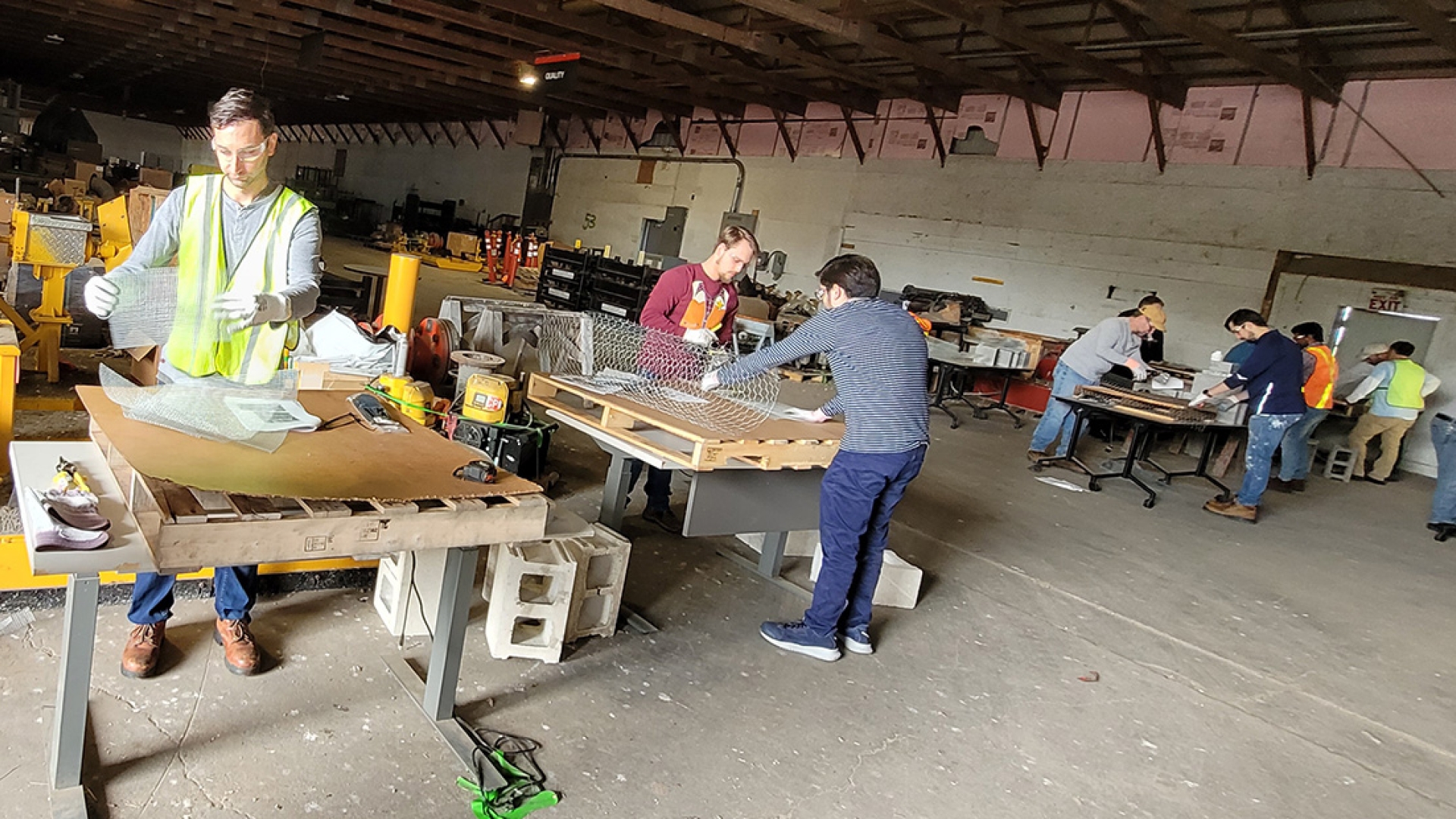 Cummins employees working on initial construction of nesting boxes