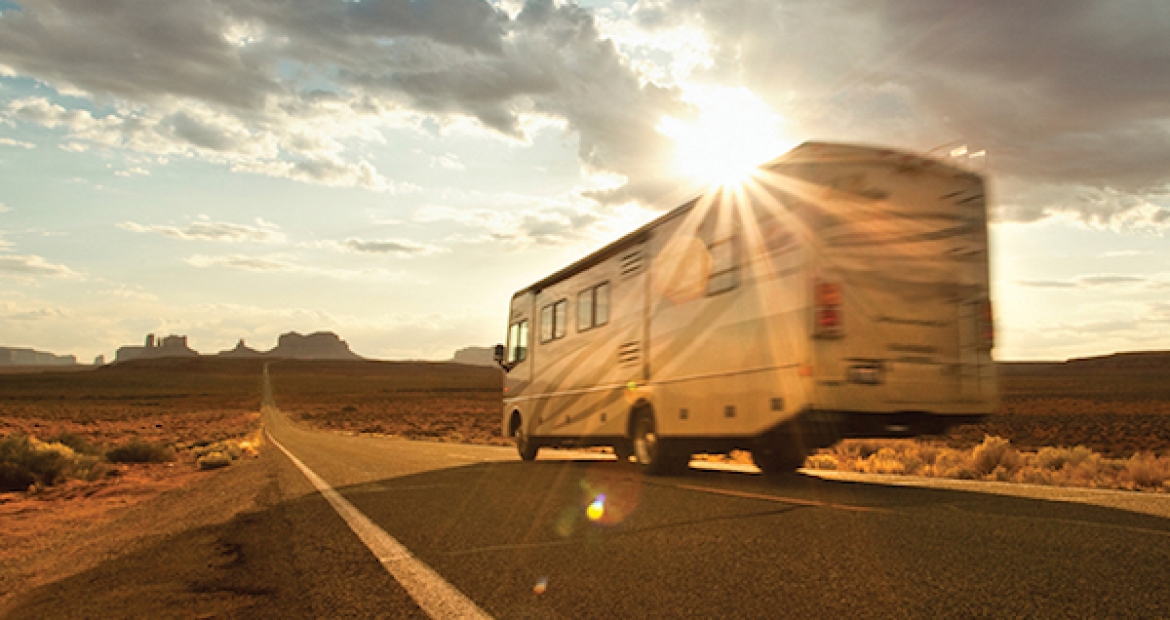 rv driving on open desert road