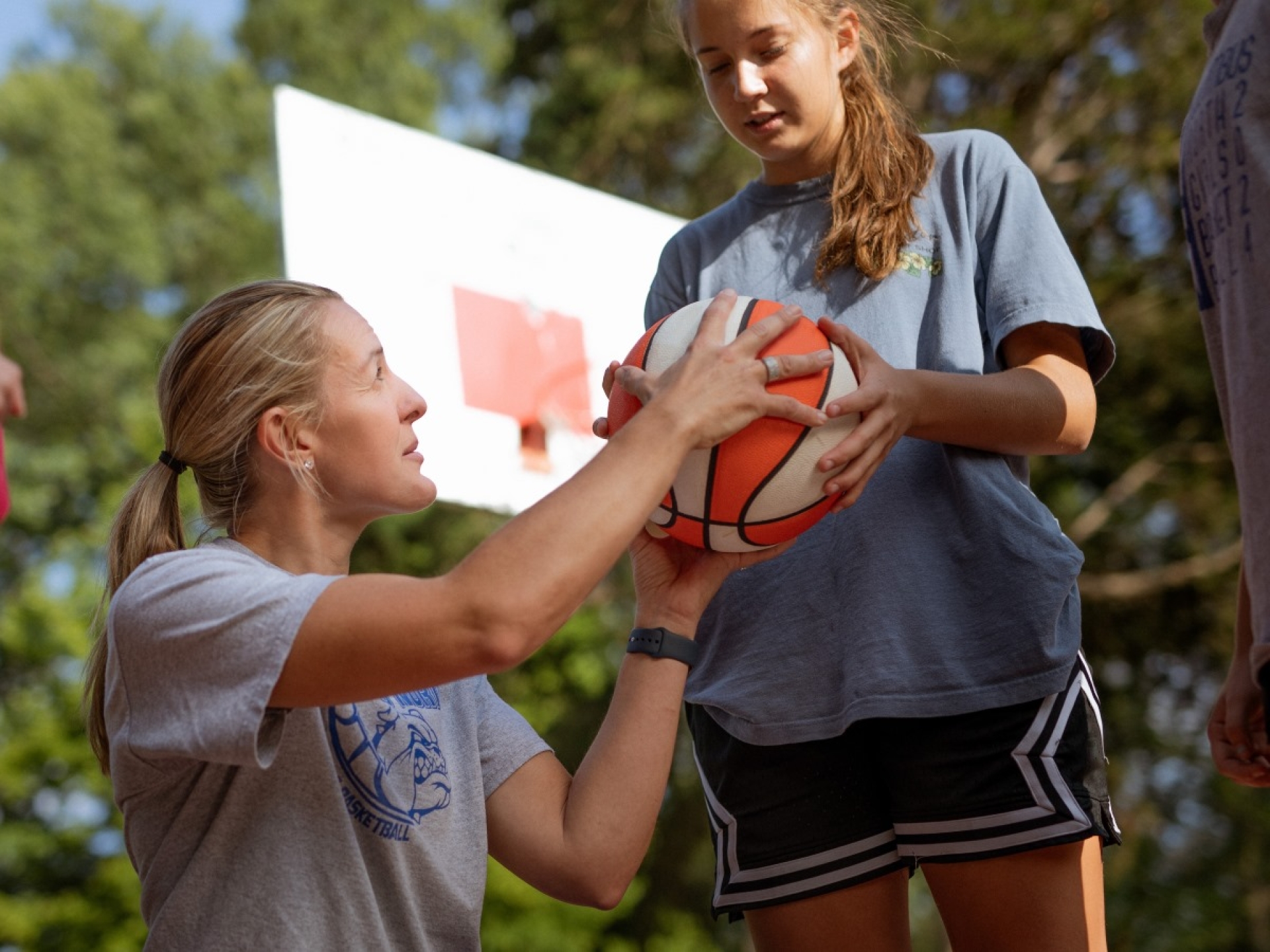 woman coaching basketball