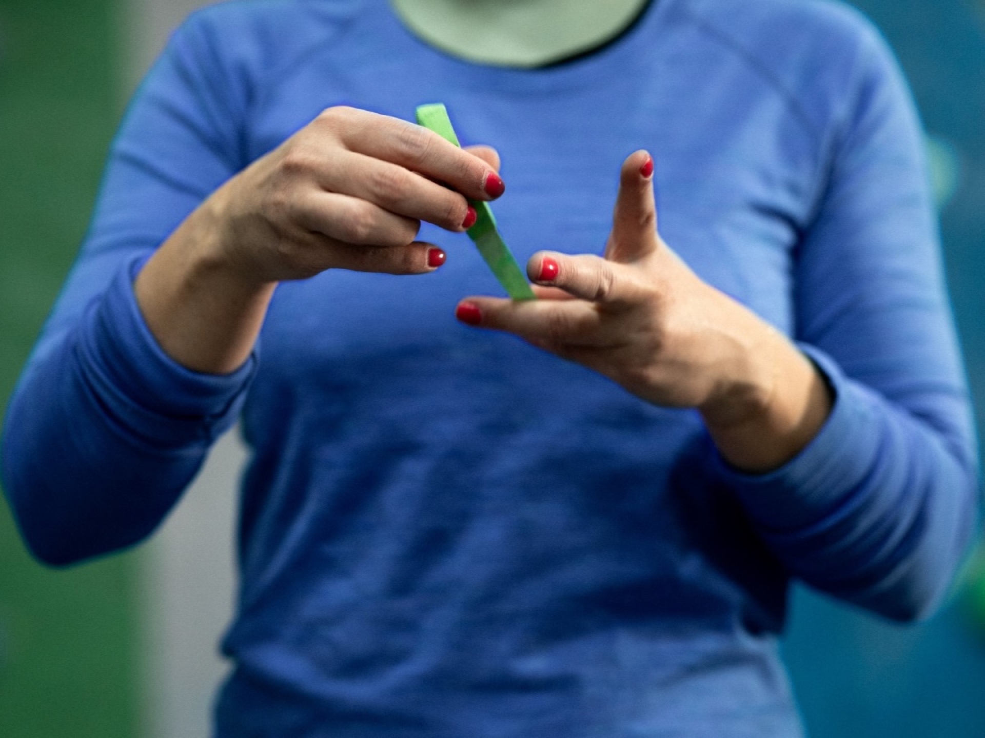 rock climber taping up hands