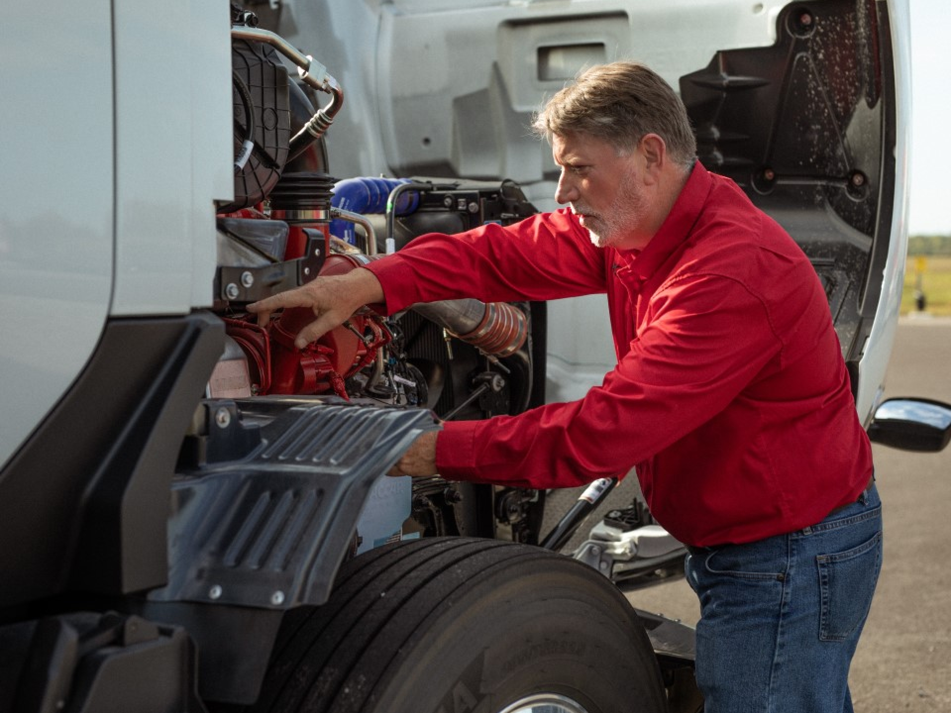 Dave King inspecting a truck using the X15N engine