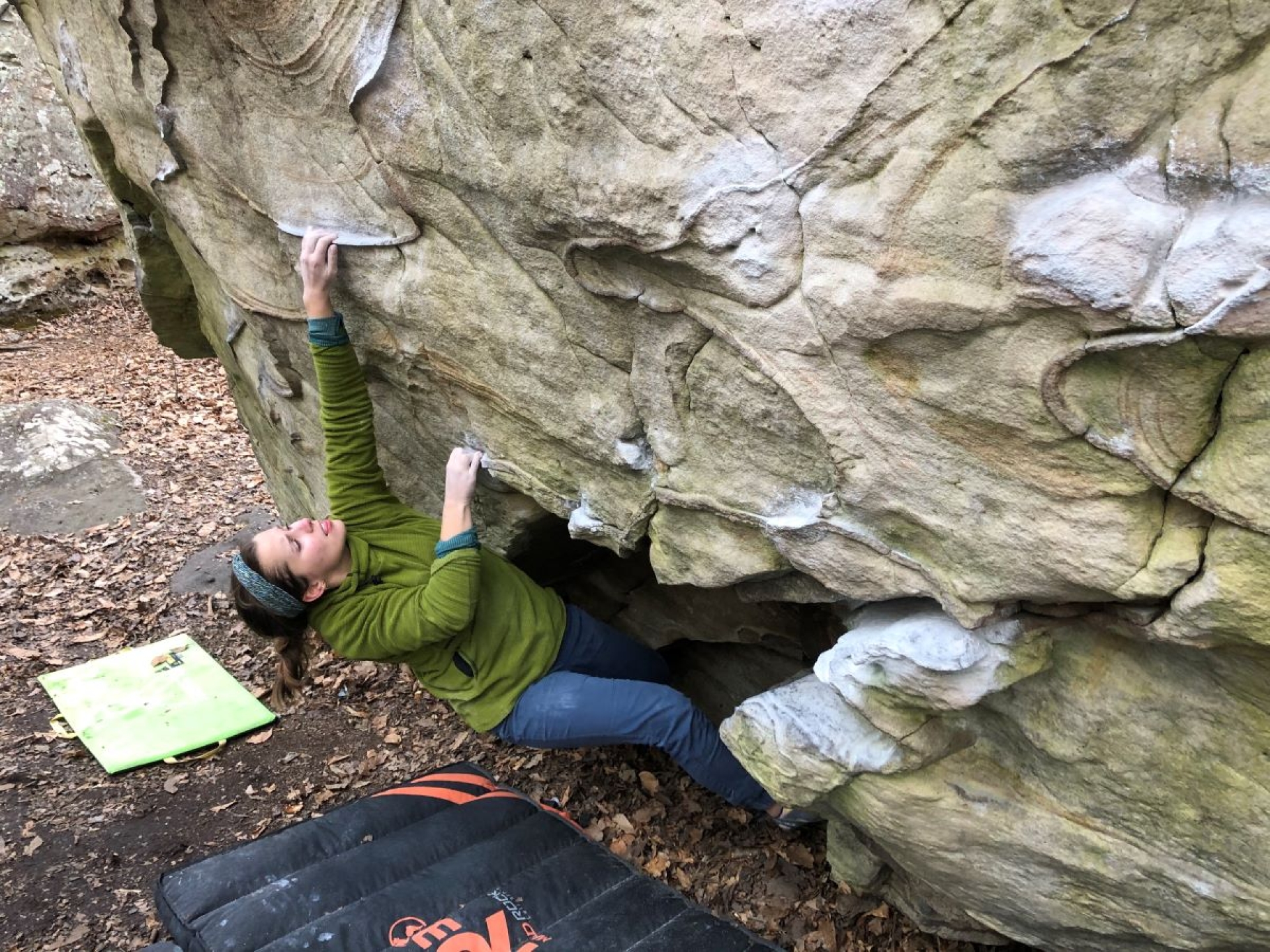 person rock climbing