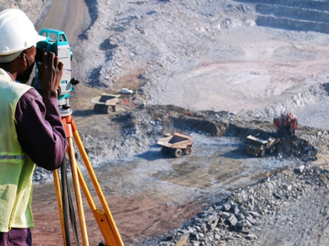 mining professional surveying mine from above