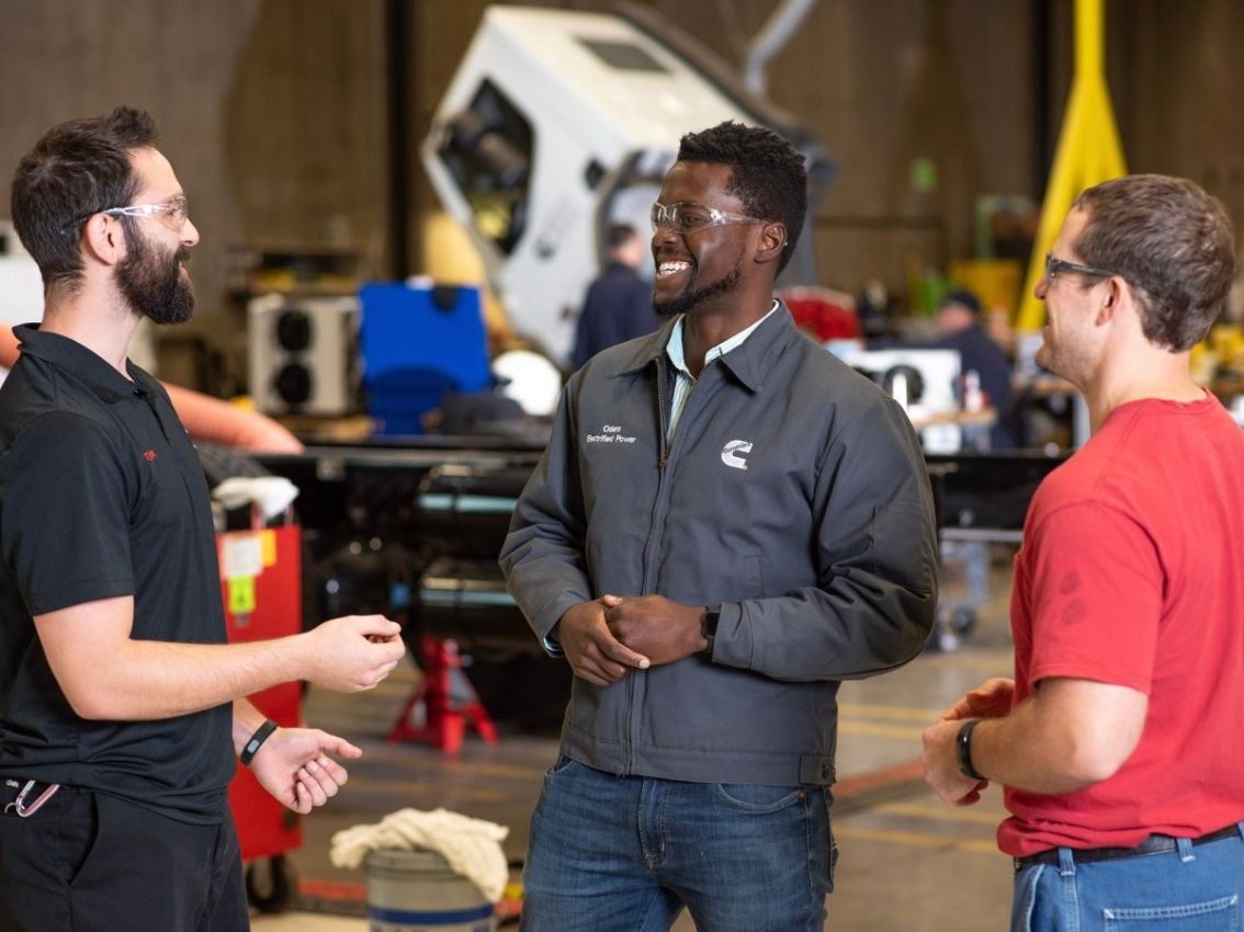 cummins employees talking to each other