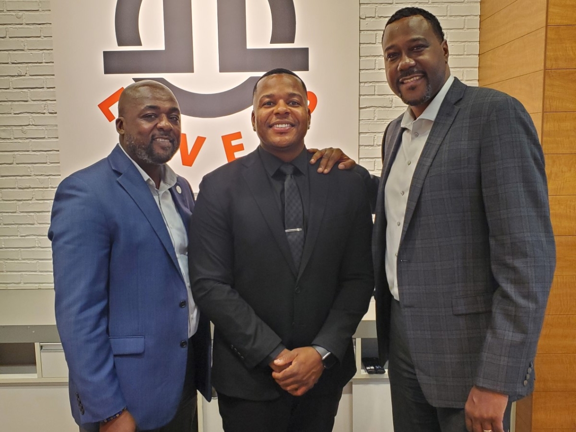 men posing for first independence bank partnership