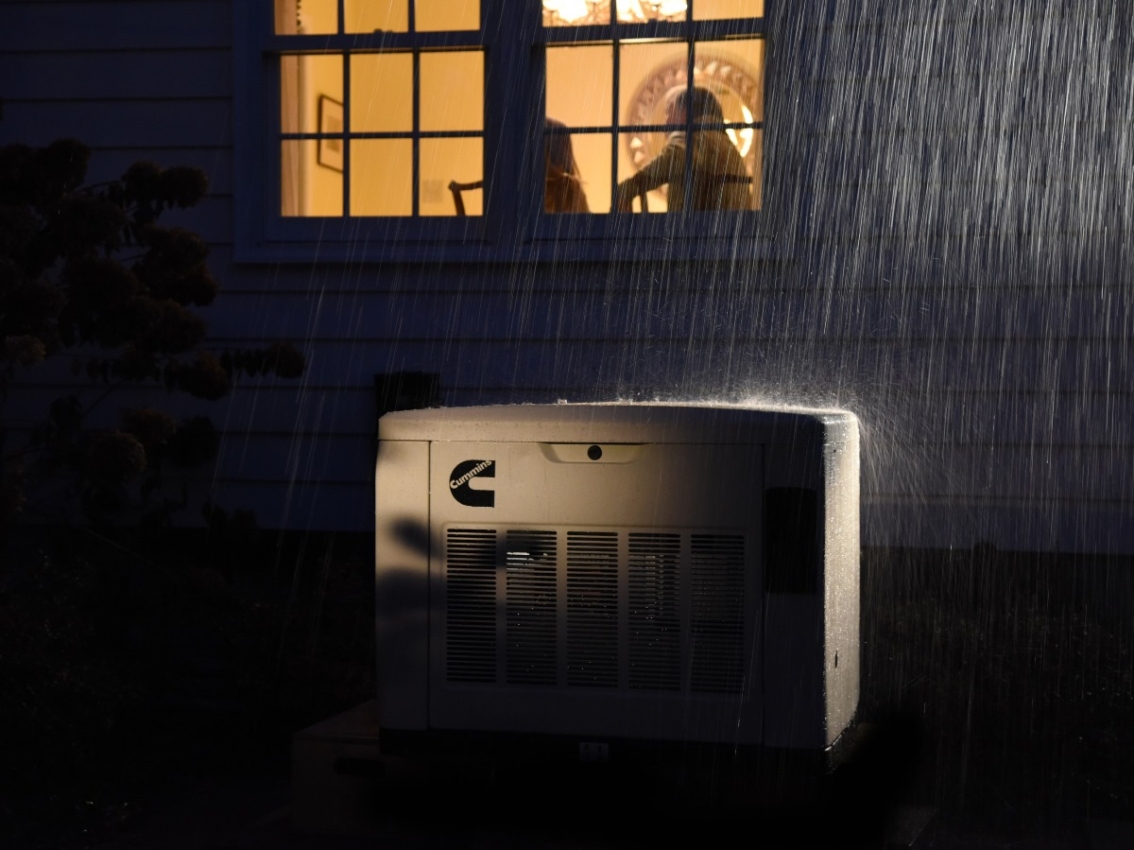 home generator outside home during storm