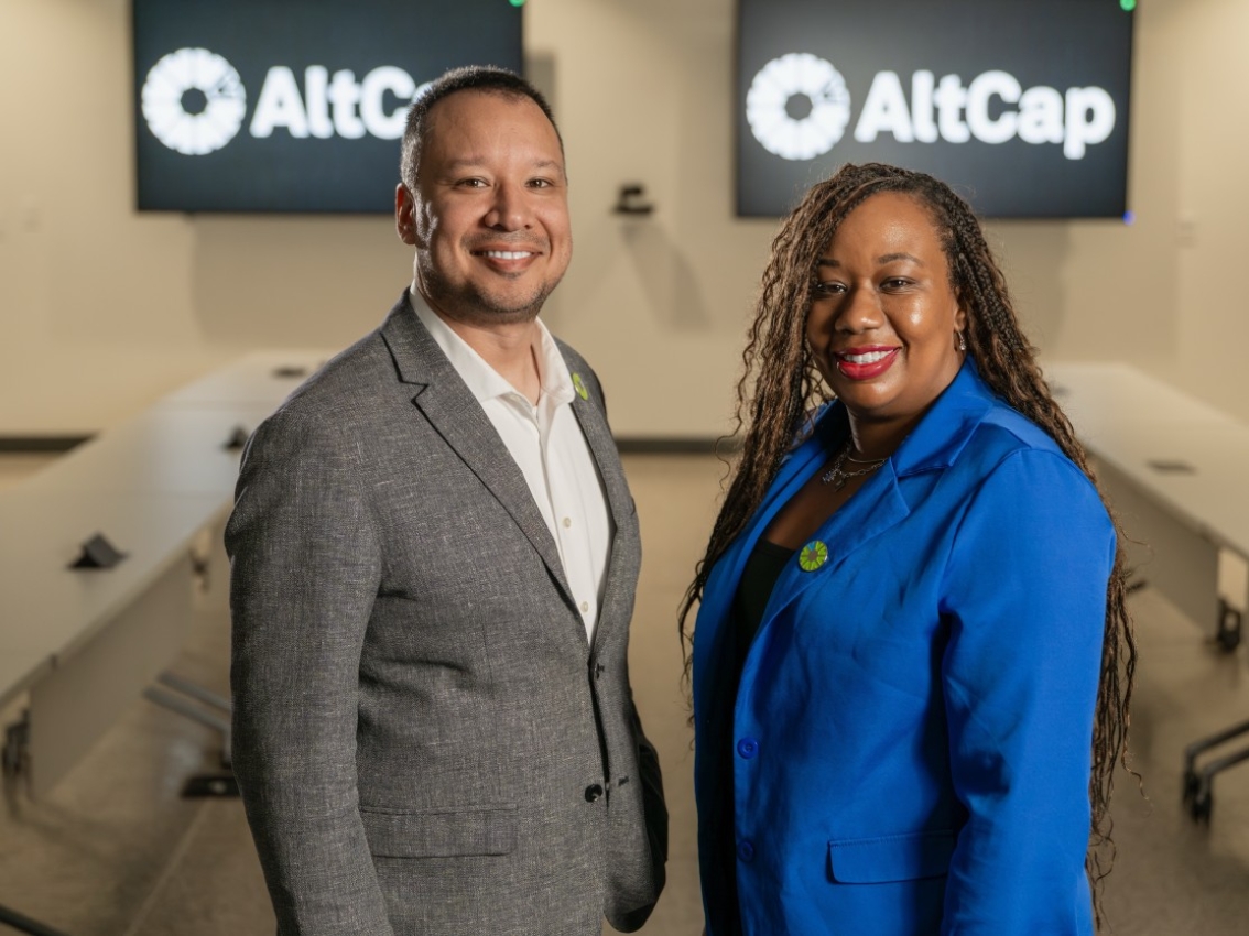 AltCap employees in board room