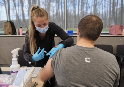 Cummins employee, Devon Harden receives his vaccination.