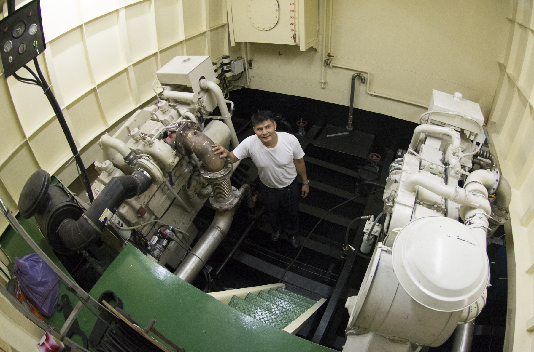 port-site engine room with a 600 HP Cummins KTA19-M main engine