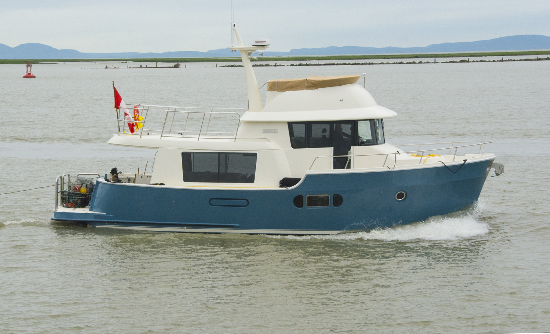 fathom boat on the water