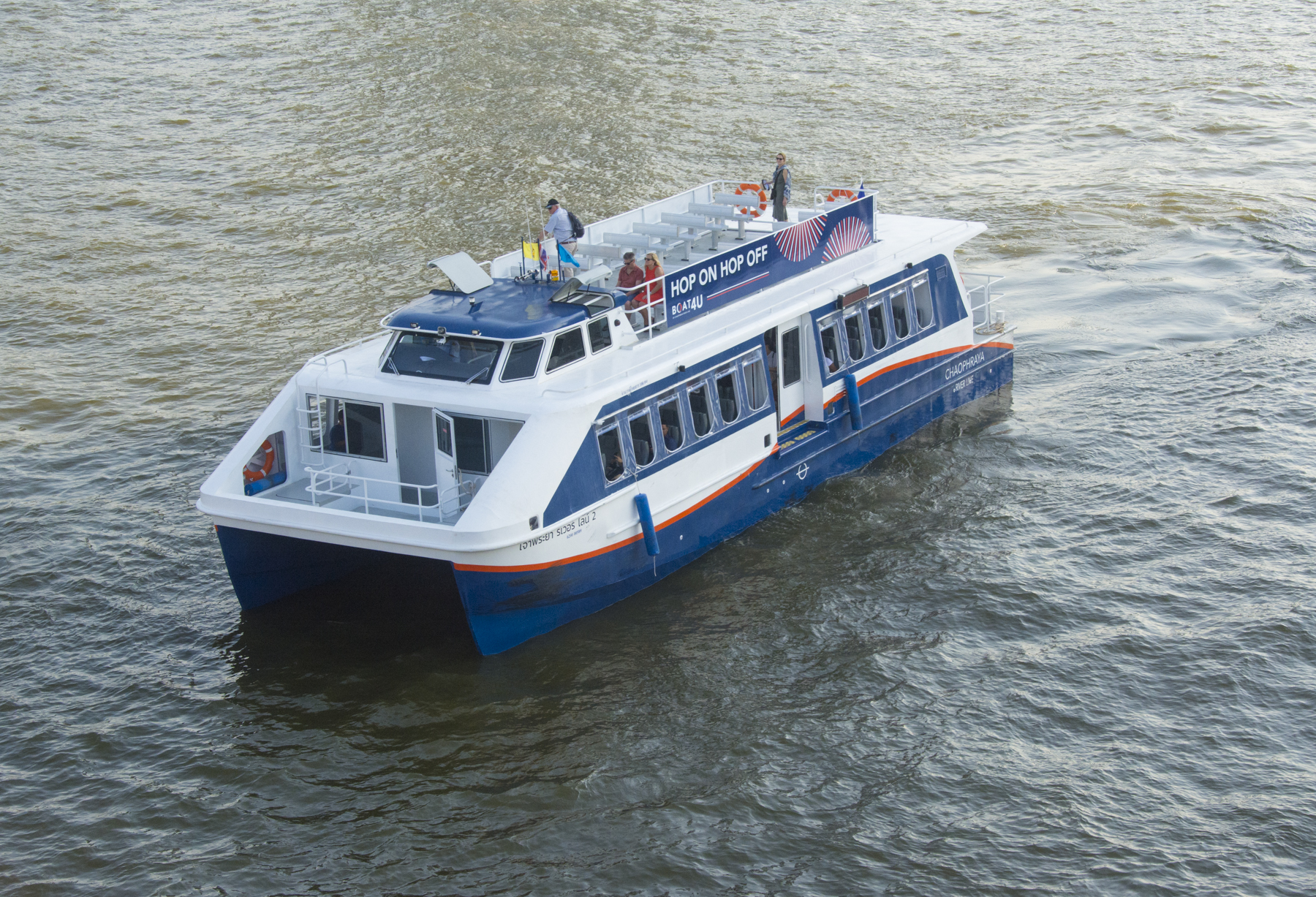 One of the 18-meter catamarans at work on the Chao Phraya River