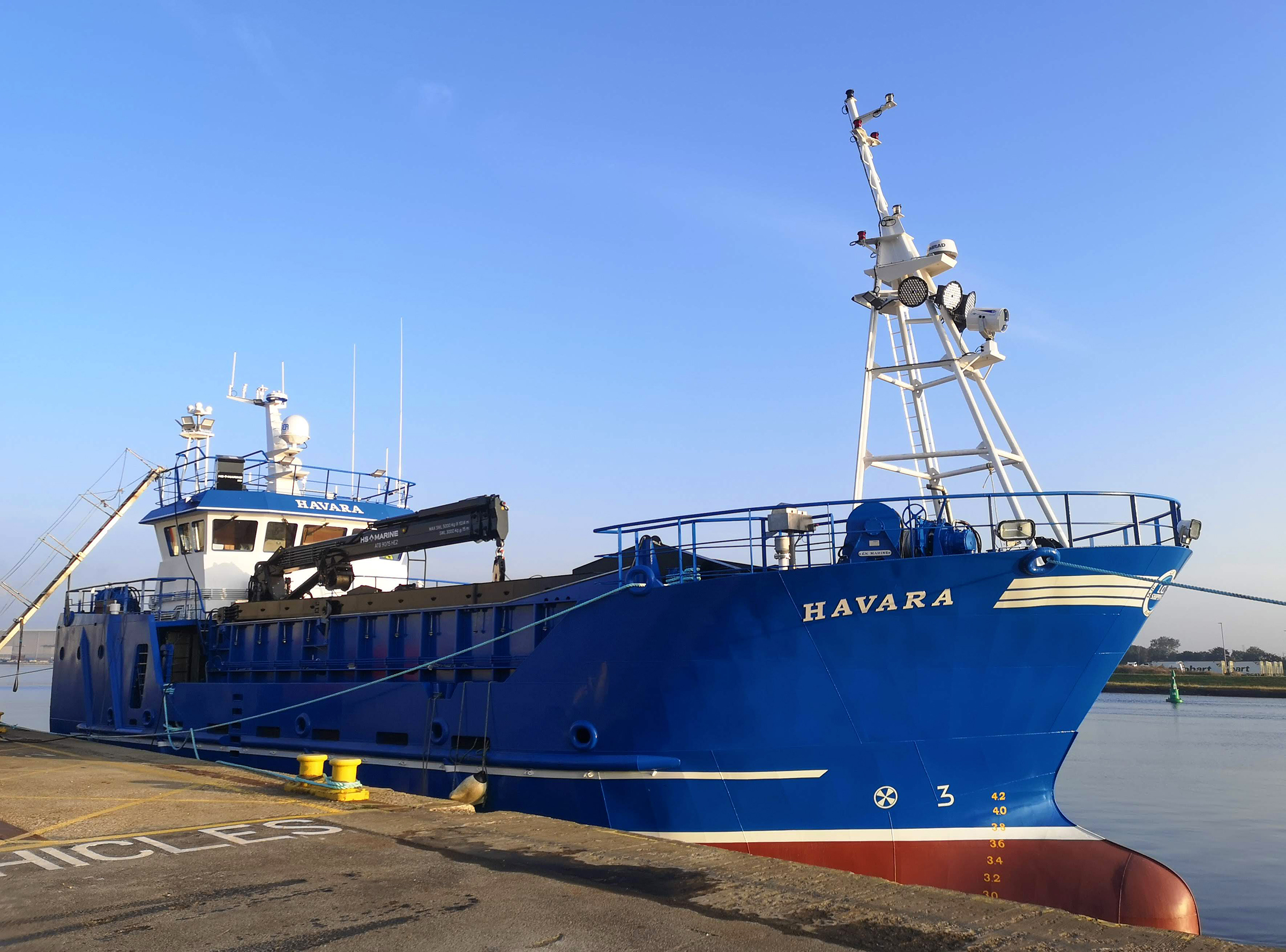 The Havara alongside at her builders. 