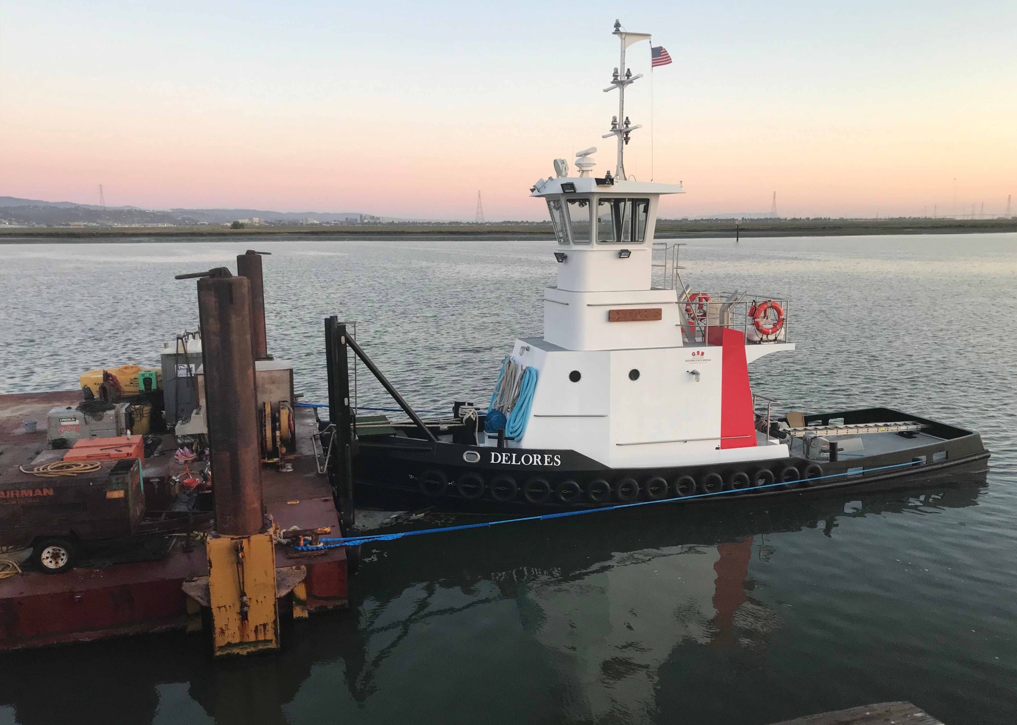 A stern view of Delores showing a clear working deck with a towing bitt.