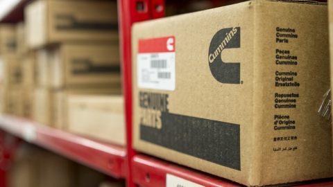 genuine parts box on warehouse shelf