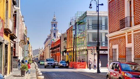 City street with no cloud in the sky