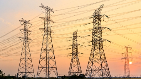 Power grid with sunset in the background