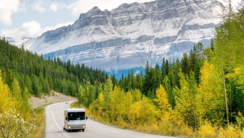 Rv driving through area near mountains