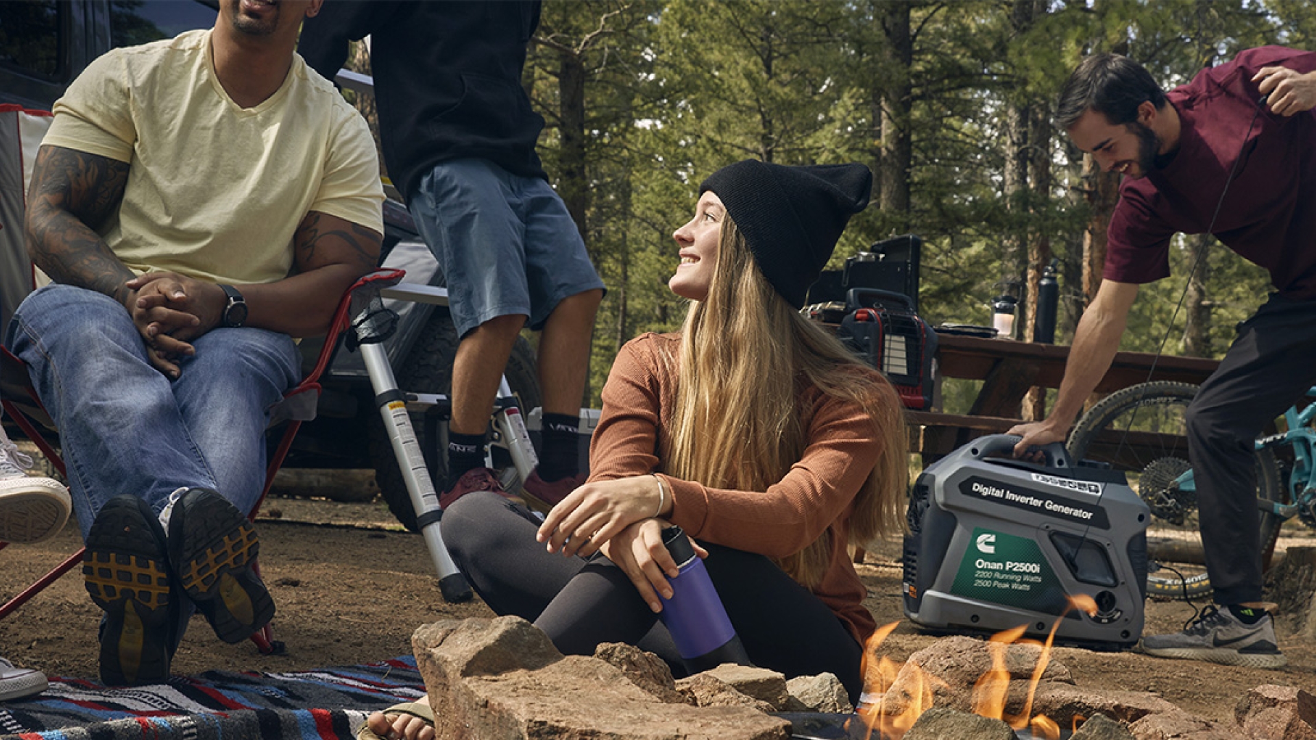 People sitting around a campfire