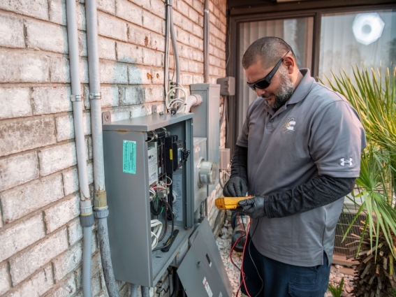 authorized dealer technician installing home generator