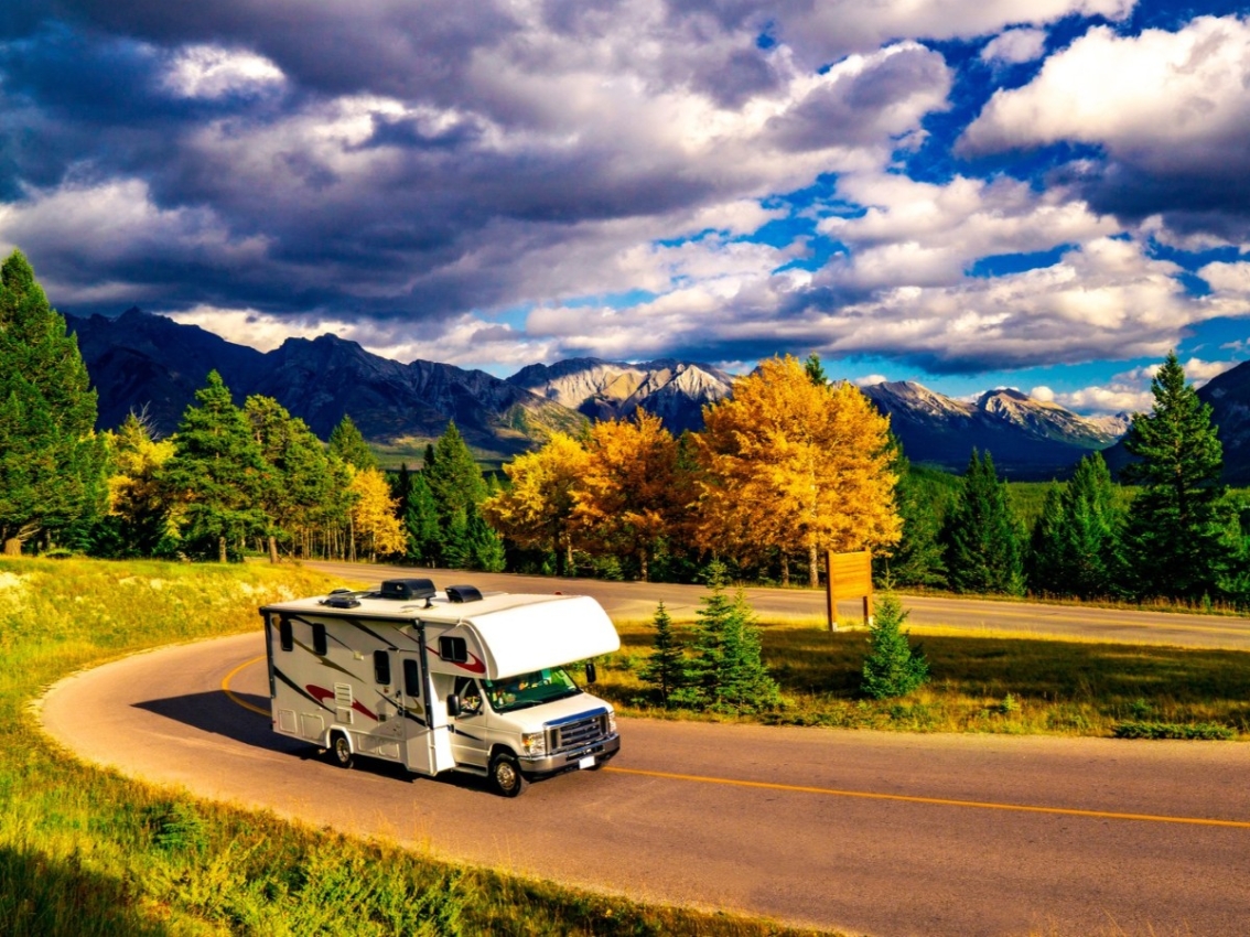 rv driving on mountain highway