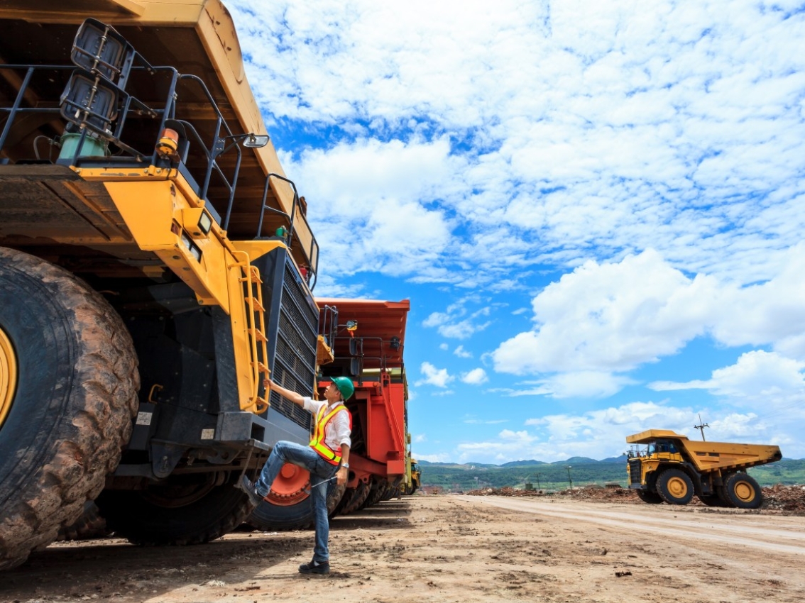 Miner about to climb into mining truck